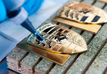 Основные этапы производства значков из металла