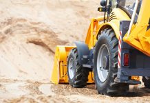 Аренда колесного экскаватора для стройки